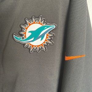 NIKE MIAMI DOLPHINS THERMA DRI-FIT
PERFORMANCE ON-FIELD JACKET NWT
MENS SIZE 3XL